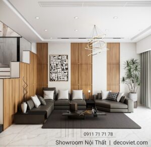 Phòng khách nhà phố Quận 7 với sofa da chữ U cao cấp và vách gỗ hiện đại